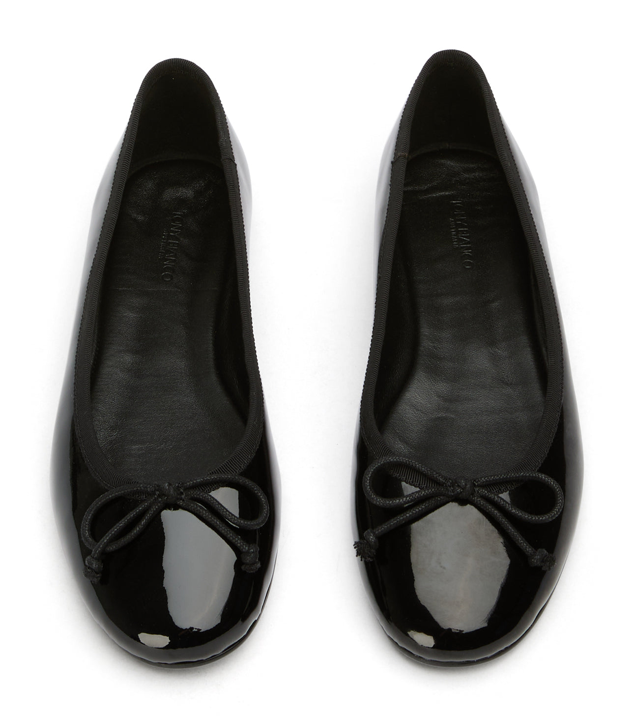 New Arrivals Tony Bianco Comma Black Patent